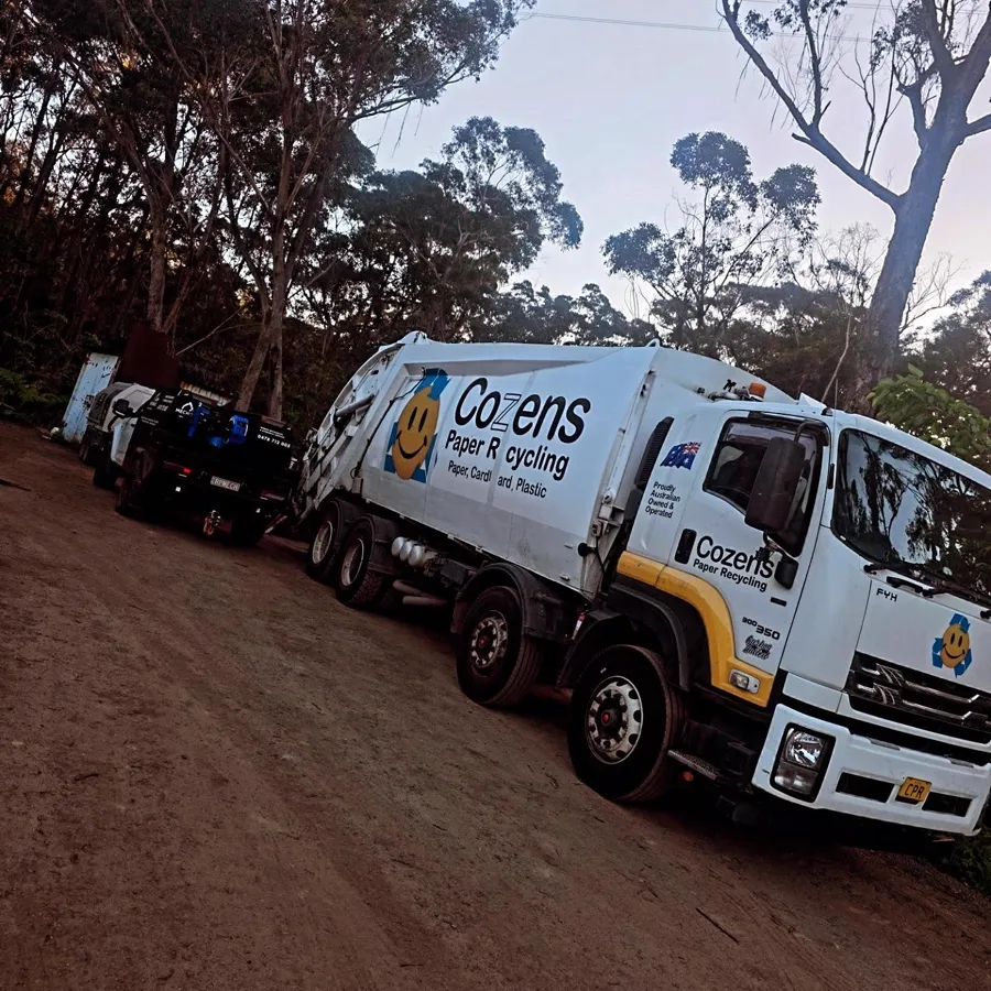 RPM ute on site with a waste collection truck